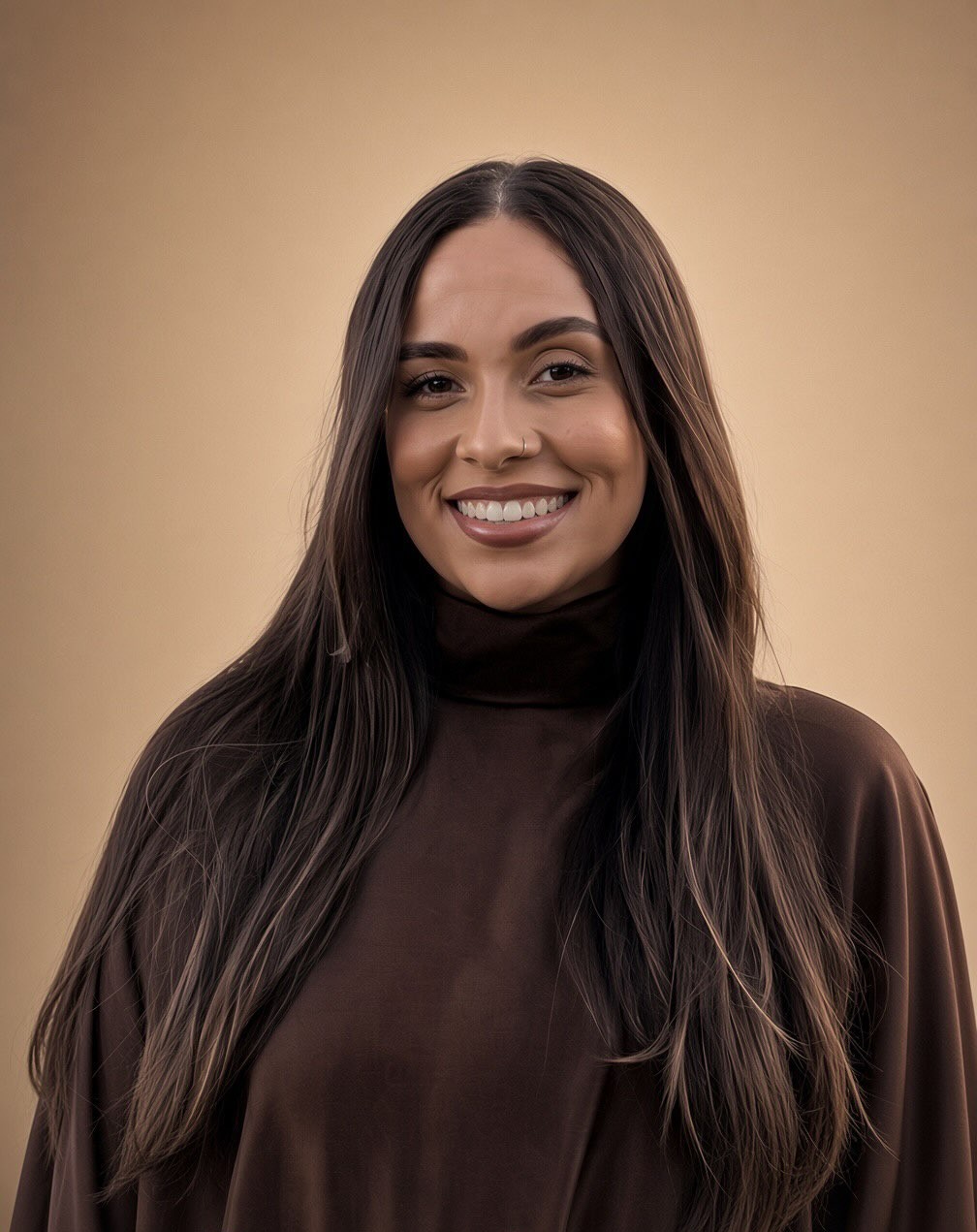 Retrato profissional de Dra. Beatriz Souza, especialista em Ortodontia e Ortopedia Facial